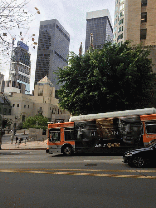 Bus Going Down Street in Downtown LA, From ImagesAttr