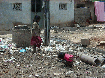 Children in unsanitary conditions in slum in India, From WikimediaPhotos