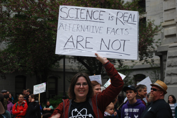 Woman holds a sign at the March for Science in Center City Philadelphia, April 22, 2017., From InText