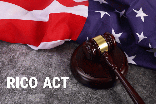 Judge gavel with american flag with RICO ACT text, From CreativeCommonsPhoto