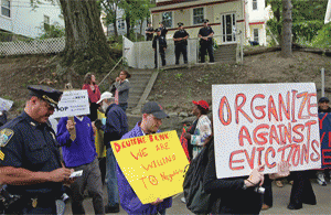 Police evict MA couple evicted despite protest.  September 2008., From ImagesAttr