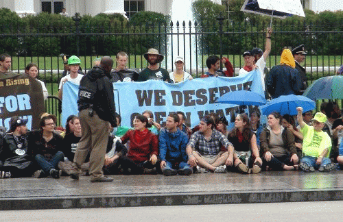 Hundred activists sit in front of the White House demanding the practice of mountaintop removal coal mining be abolished., From ImagesAttr
