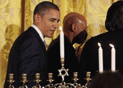 Obama and menorah on Hanukkah at White House, From ImagesAttr