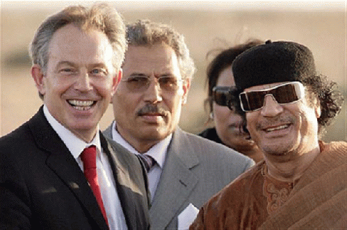 Mad leader poses with Gaddafi, From ImagesAttr