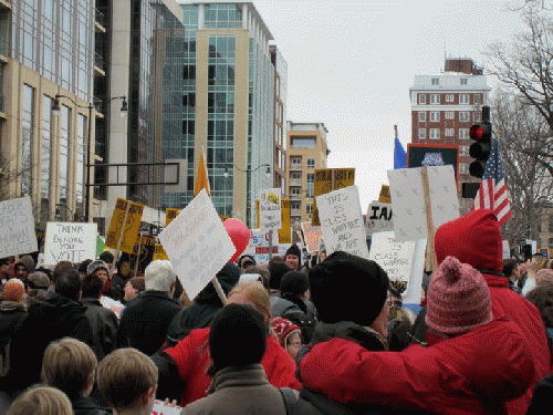 Everyday Wisconsinites Display Their Protest Signs, From ImagesAttr