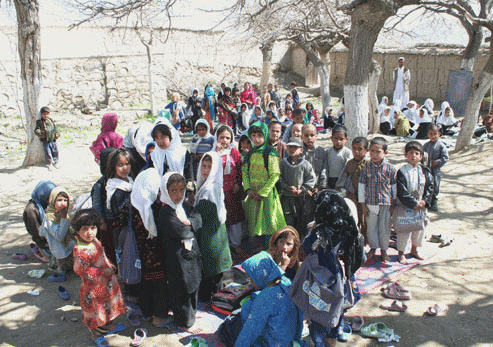 School is held outdoors in the dirt for many Afghan children, From ImagesAttr