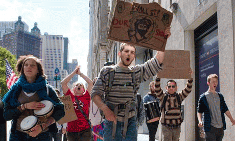 Anti-capitalist protesters march through Lower Manhattan, New York. Photograph: