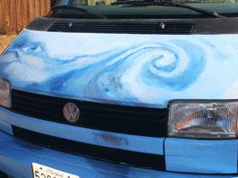 Groovy flashback: parked, decorated East Coast VW bus waits patiently.