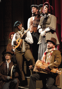 Carolers performed Victorian carols, accompanied by antique instruments.