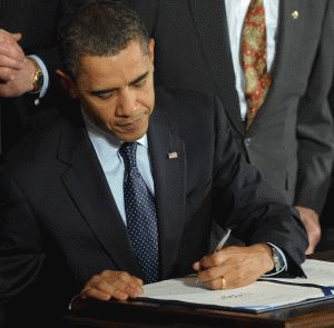 President Obama signing the Patient Protection and Affordable Care Act