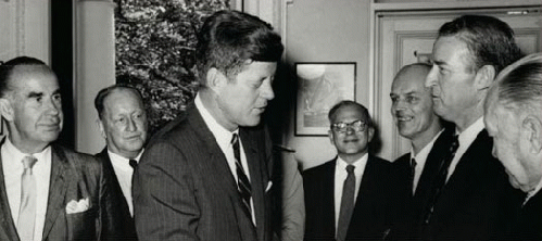 President Kennedy, Frank Braynard is directly to the right of the president.