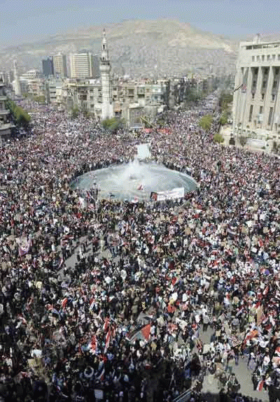 A PRO-Assad rally in Damascus, Syria, 3/29/11, globalresearch.ca