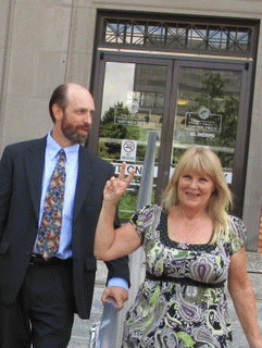 Attorney Ben Scales & Citizen Journalist Lisa Landis leave courtroom victoriously