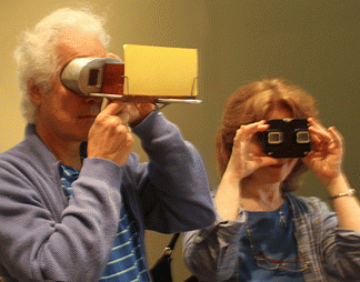Dr. Dan and Beth Redwood try out the Stereoscope and View Master