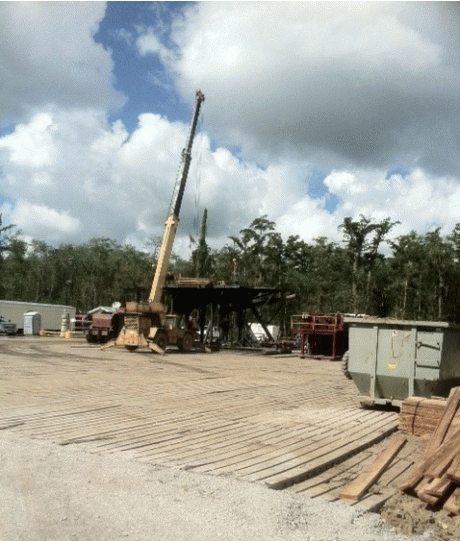 Exploratory rig being assembled approx 950â€™ from the sinkhole, Aug 16