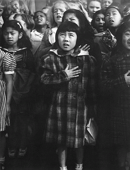 American children reciting the pledge of allegiance, 1942.