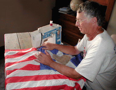 Bob McNary stitches the flag., From ImagesAttr