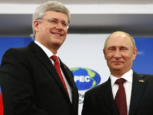 Putin told Harper to stop threatening other countries