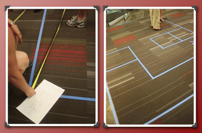 Workshop participants tape out the floor plans of three Tumbleweed Tiny Houses