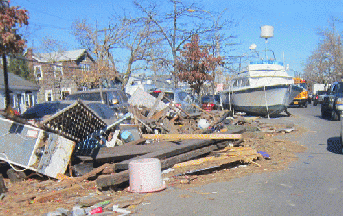 Debris and boat in the boulevard.