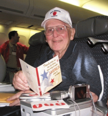 Orville Lemke, surprised on the flight home with letters of gratitude.