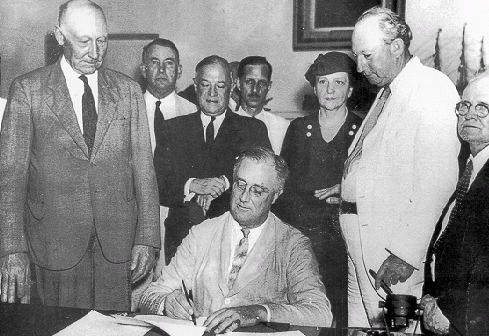 FDR signs Social Security Act, which has provided security for 77 years