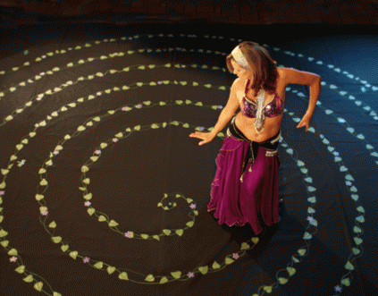 Debi Kermeen dancing the Nature-Inspired painted canvas labyrinth Debi Kermeen dancing the Nature-Inspired painted canvas labyrinth