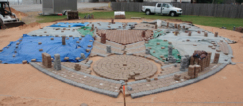 Stones are positioned in the The Heart in the Park Labyrinth.