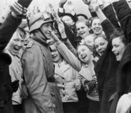 Austrians salute Nazi troops during the Anschluss of 1938, Public Domain