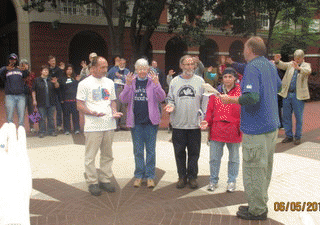 Defendants and Supporters prepare to enter courtroom, From ImagesAttr