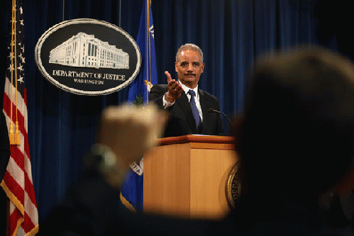 Attorney General Eric H. Holder Jr. announced at a news conference on Tuesday that the Justice Department would open a criminal investigation into the Internal Revenue Service's focus on conservative groups., From ImagesAttr