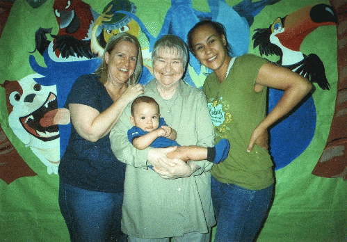 Lynne Stewart (center) and Some Family.