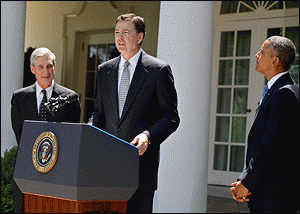 James B. Comey at lectern with President Obama and FBI Director Robert Mueller. Comey has been nominated by the president to replace Mueller as FBI Director.