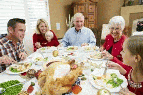 Multi Generation Family Celebrating With Christmas Meal, From ImagesAttr