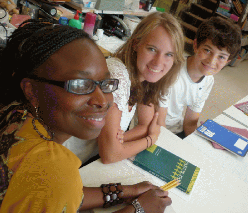 Ms. Julia, Lydia and Max pause from Summer work