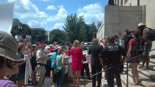 Acress Daryl Hannah (in red) led the rally today, From ImagesAttr