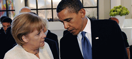 German Chancellor Angela Merkel and U.S. President Obama at G-8 summit. (photo: Getty Images), From ImagesAttr