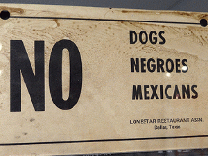 No Dogs-Negroes-Mexicans - Racist Sign from Deep South - National Civil Rights Museum - Downtown Memphis - Tennessee - USA No Dogs-Negroes-Mexicans - Racist Sign from Deep South - National Civil Rights Museum - Downtown Memphis - Tennessee - USA