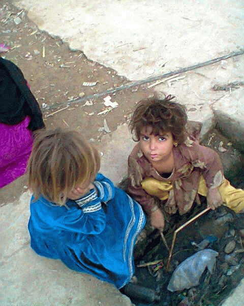 Extreme hunger sometime forces the human beings to search livelihood in the dirt. Small girls in the pictures are searching foods in the dirt. They might be extreme hungry. This world is really strange place.