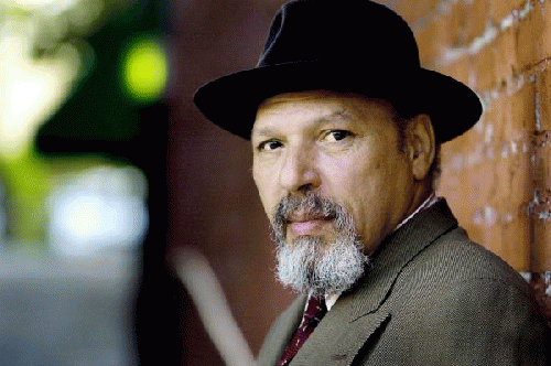 Pulitzer Prize-winning playwright August Wilson poses during a visit to Kansas City, Mo. (Oct. 2, 2005), From ImagesAttr