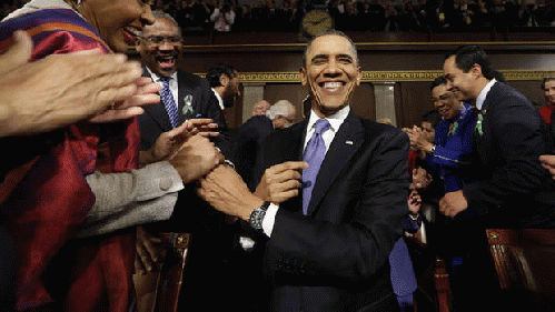 U.S. President Barack Obama is greeted before his State of the Union address during a joint session of Congress on Capitol Hill on February 12, 2013 in Washington, D.C