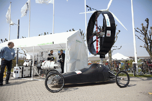 DTU's wind-powered race car at an outdoor stand, From ImagesAttr