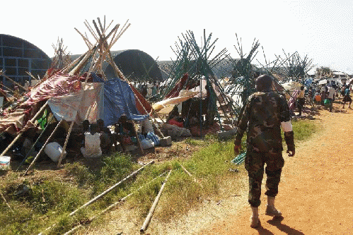 Civilians at the UN House compound on the southwestern outskirts of Juba. Up to 13,000 South Sudanese civilians have sought refuge at the UN compounds in Juba, fleeing fighting between members of the SPLA (Sudan Peopleâ€™s Liberation Army), From ImagesAttr