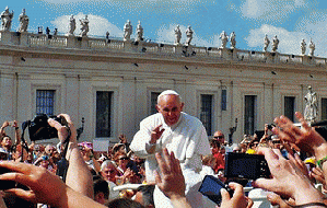 Pope Francis greets the enthusiastic crowd in St Peters Piazza.  May 8,  2013