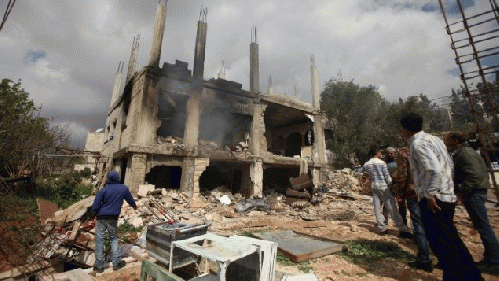 Ruins of the house of Palestinian Moataz Washaha whom Israeli troops killed in the Palestinian West Bank town of Birzeit on February 27, 2014 on â€œsuspicionâ€ of being armed and â€œintendsâ€ to carry out terror act â€œin futureâ€, From ImagesAttr