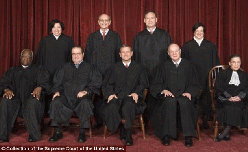 Conservative victory: Justice Clarence Thomas (bottom left) wrote that he supported the decision but would have gone further and gotten rid of all spending limits entirely, From ImagesAttr