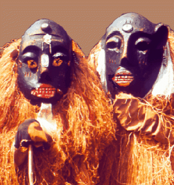 Two African Witch Doctors Wearing Masks, From ImagesAttr