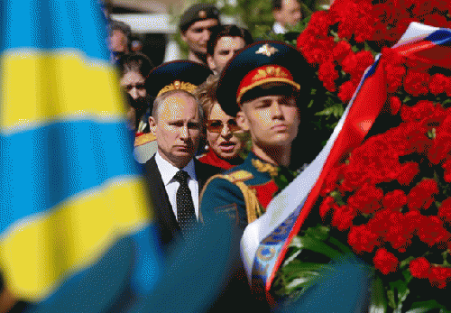 Russia's president, Vladimir Putin, attends a wreath-laying ceremony at the Tomb of Unknown Soldier outside the Kremlin in Moscow, to mark the 69th anniversary of victory in the second world war., From ImagesAttr