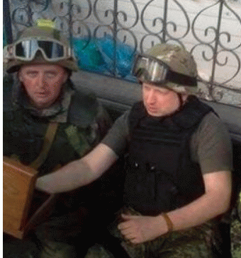 Photo taken on the outskirts of Slavyansk, at the HQ of Ukrainian â€œantiterrorist operationâ€ command. Jerzy Dziewulski (left) and Alexander Turchinov