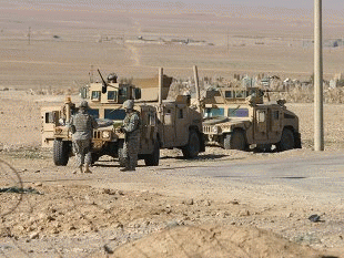 Unidentified USA soldiers stands guard in a check point on January 26, 2007 in Maxmur, Iraq.